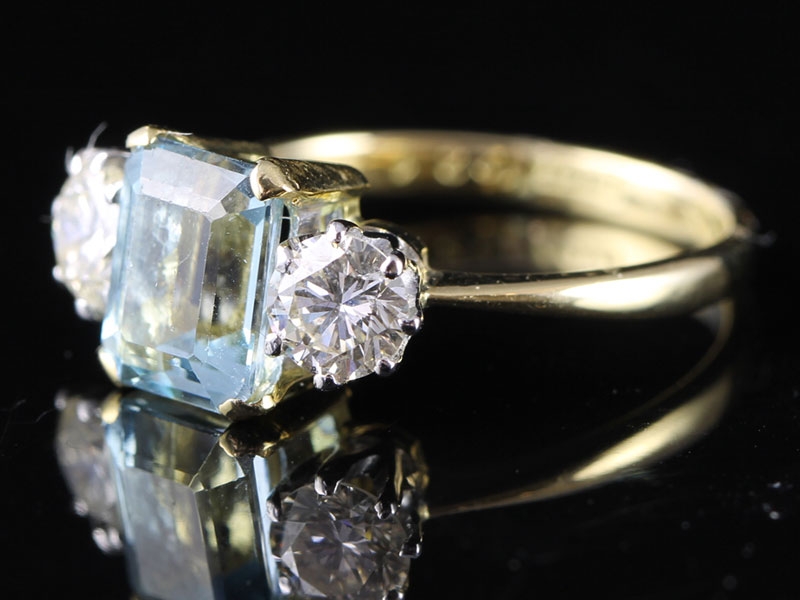 FABULOUS AQUAMARINE AND DIAMOND TRILOGY 18 CARAT GOLD RING