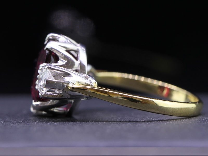 ELEGANT RUBELLITE AND DIAMOND TRILOGY 18 CARAT GOLD RING