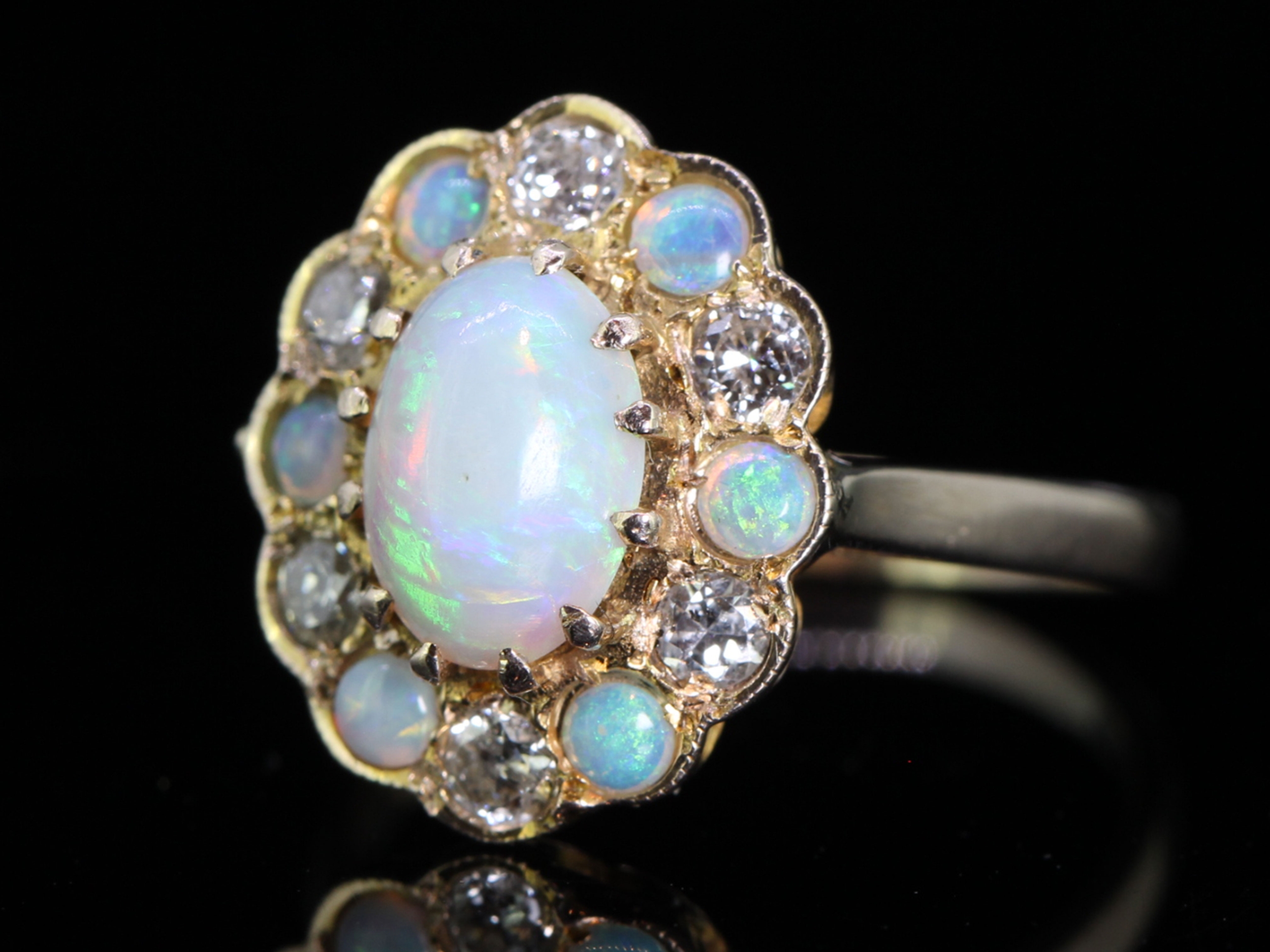 Tantalizing Opal and Diamond 9 carat Gold Cluster Ring