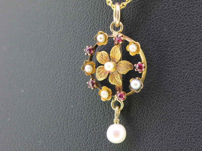 PRETTY RUBY AND PEARL 15 CARAT GOLD PENDANT