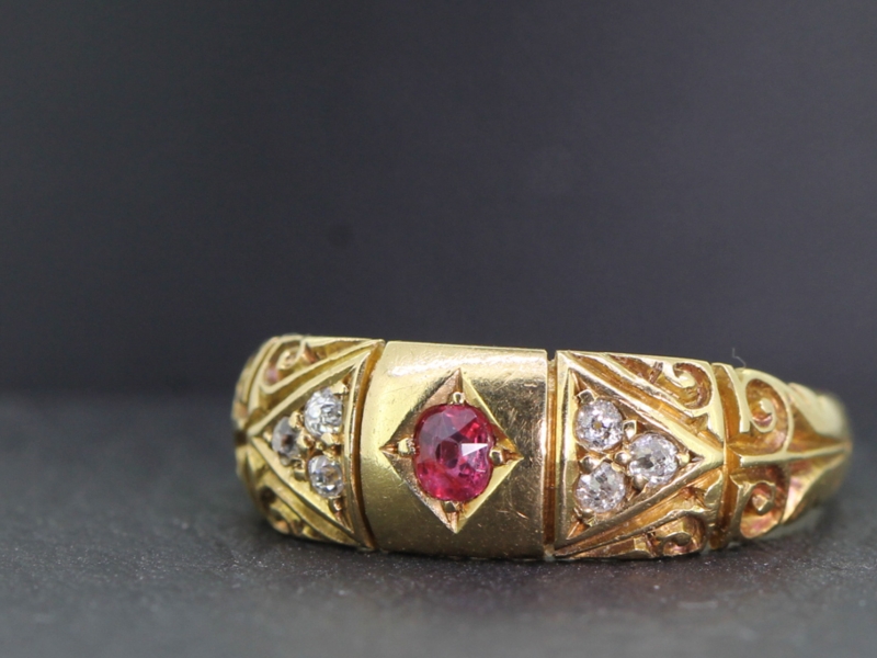 PRETTY RUBY AND DIAMOND 18 CARAT GOLD BAND