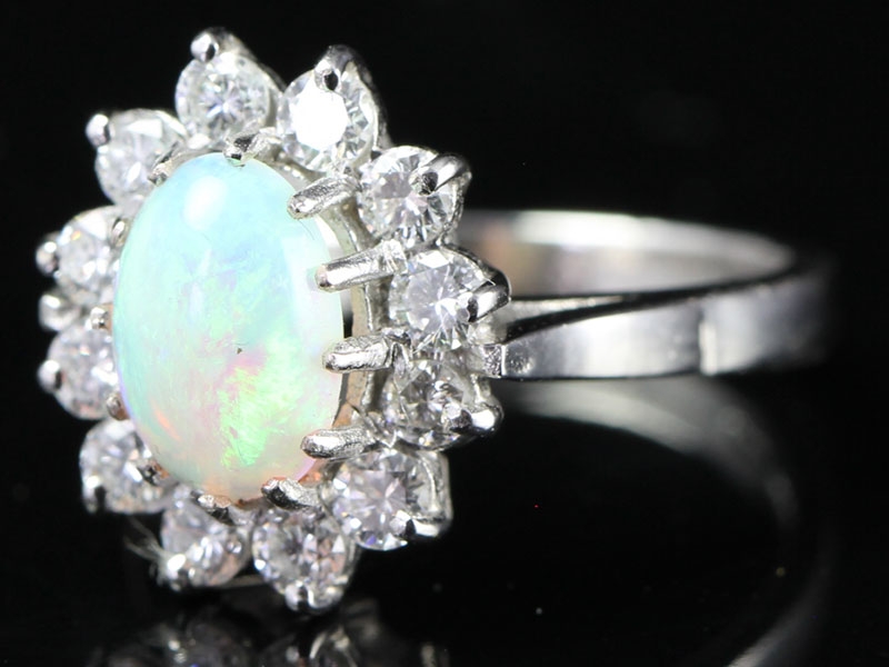 BREATH TAKING AUSTRALIAN OPAL AND DIAMOND 18 CARAT GOLD CLUSTER RING