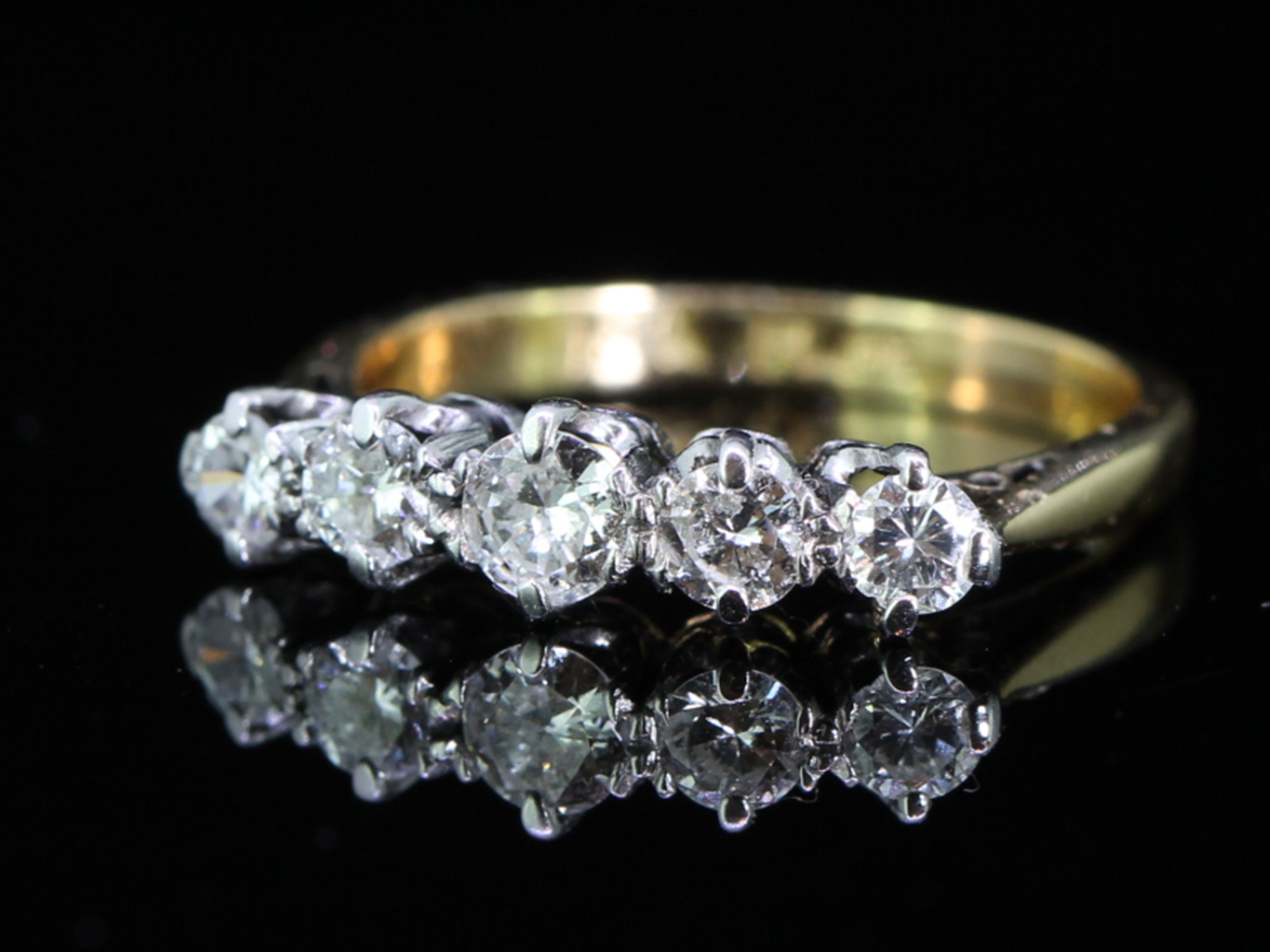 Dramatic 5 Stone Platinum and 18 Carat Gold Ring