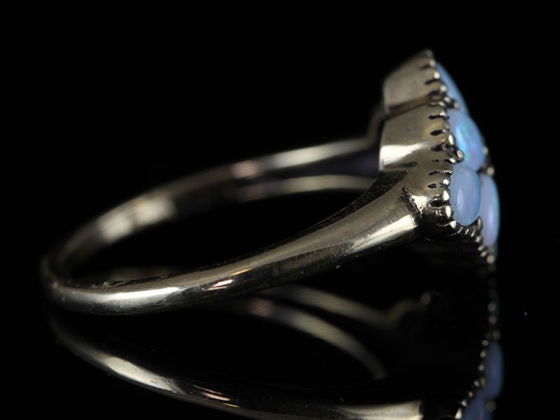 A VERY PRETTY  9 CARAT GOLD OPAL AND DIAMOND FLOWER RING