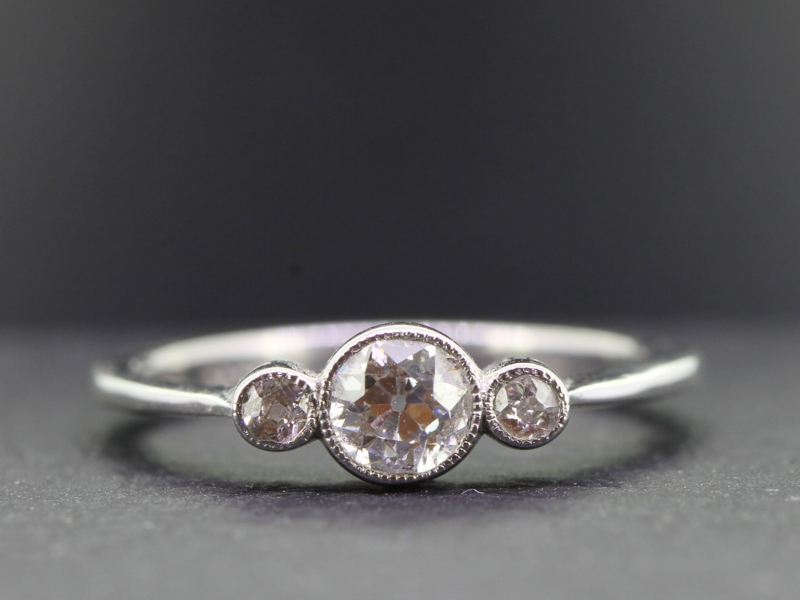 EXQUISITE EDWARDIAN THREE STONE DIAMOND 18 CARAT GOLD RING