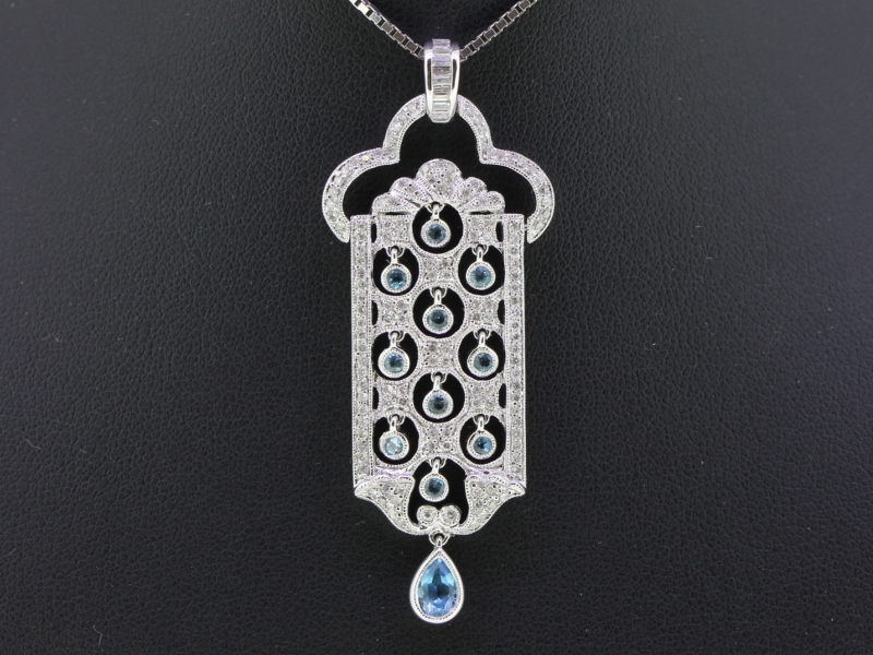 STUNNING AQUAMARINE AND DIAMOND 18 CARAT GOLD PENDANT AND CHAIN