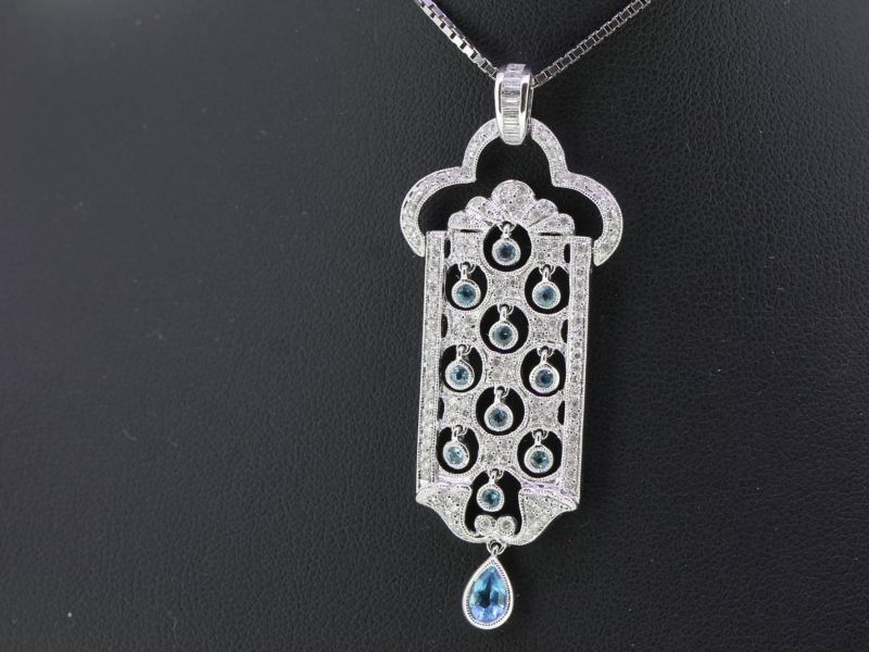 STUNNING AQUAMARINE AND DIAMOND 18 CARAT GOLD PENDANT AND CHAIN