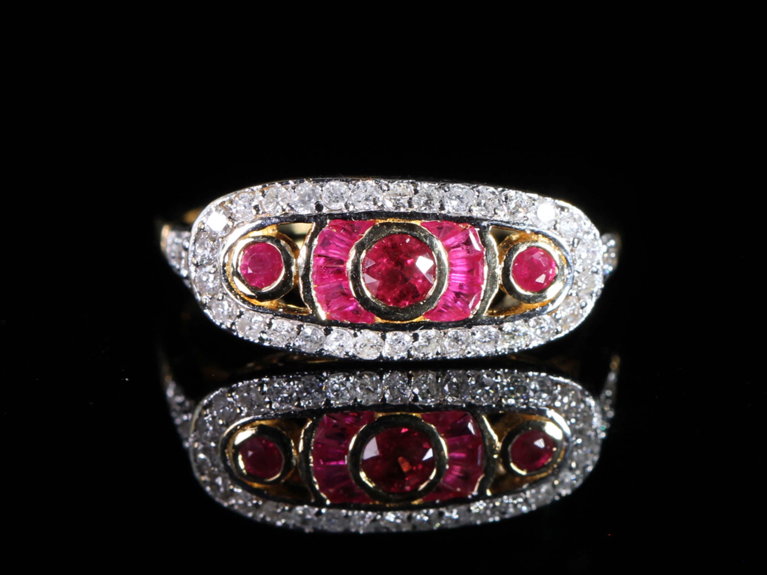 An Estate Ruby and Diamond Art Deco Style 18ct Gold Ring