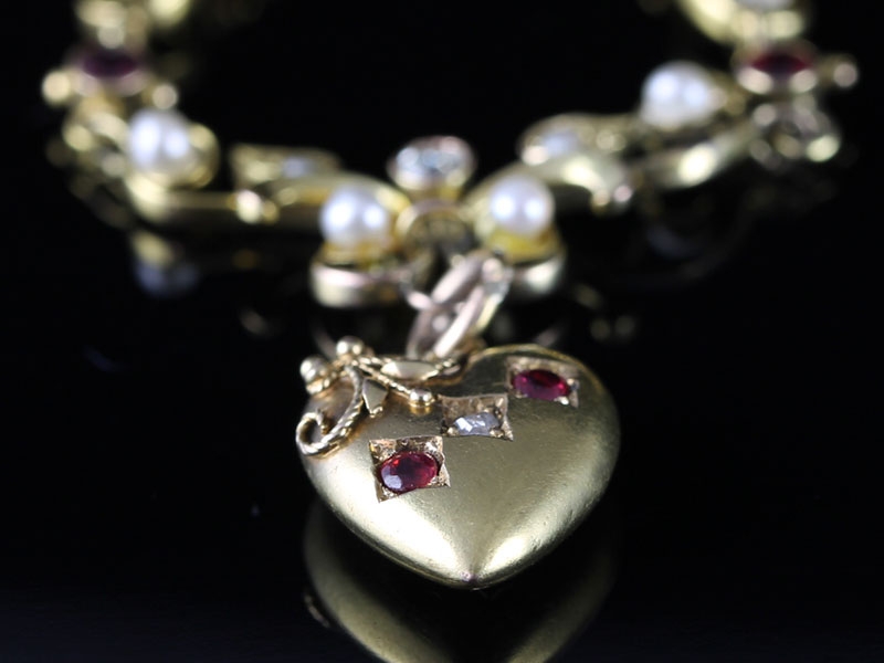 STUNNING EDWARDIAN RUBY, DIAMOND, AND PEARL HEART NECKLACE/PENDANT IN 15 CARAT GOLD