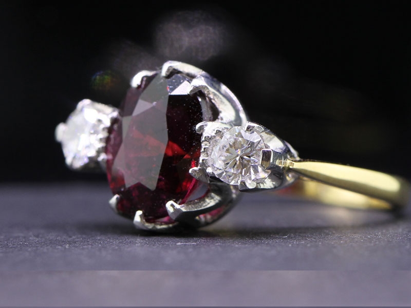 ELEGANT RUBELLITE AND DIAMOND TRILOGY 18 CARAT GOLD RING