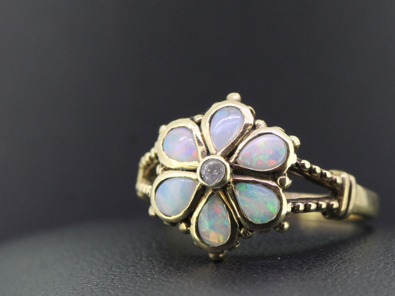 EQUISITE 9 CARAT GOLD OPAL AND DIAMOND DAISY FLOWER RING