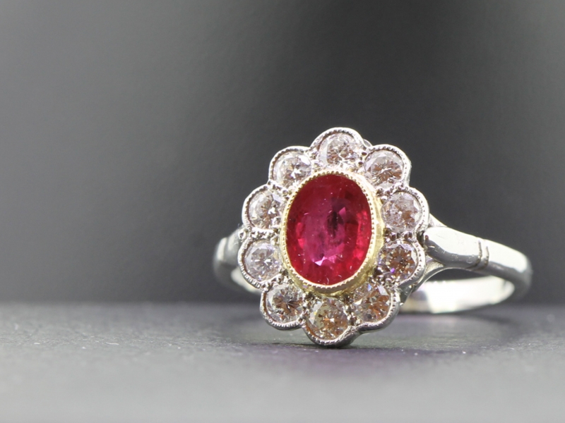  FABULOUS RUBY AND DIAMOND 18 CARAT GOLD AND PLATINUM CLUSTER RING.