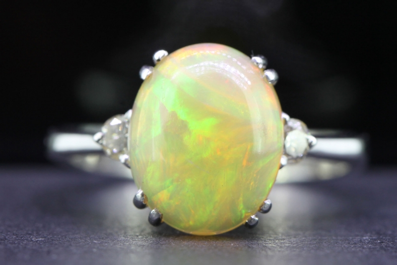  WONDERFUL OPAL AND DIAMOND THREE STONE 18 CARAT GOLD RING