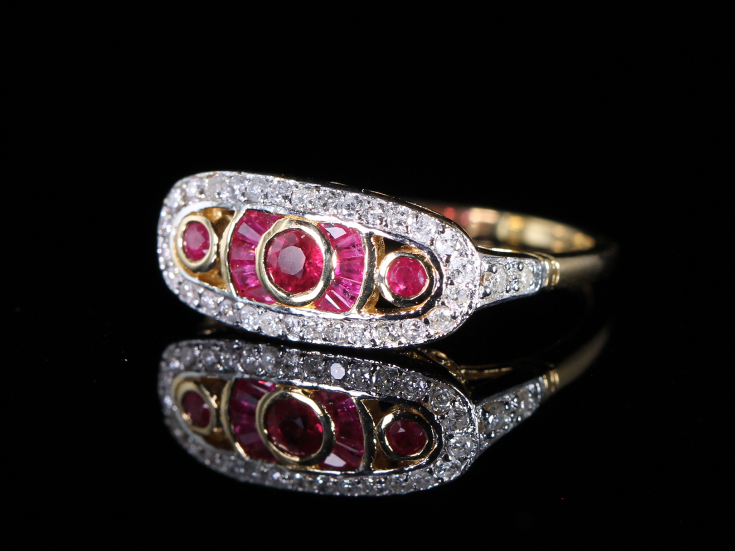 An Estate Ruby and Diamond Art Deco Style 18ct Gold Ring