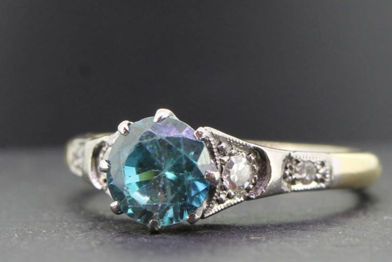 STUNNING BLUE ZIRCON AND DIAMOND 18 CARAT GOLD RING