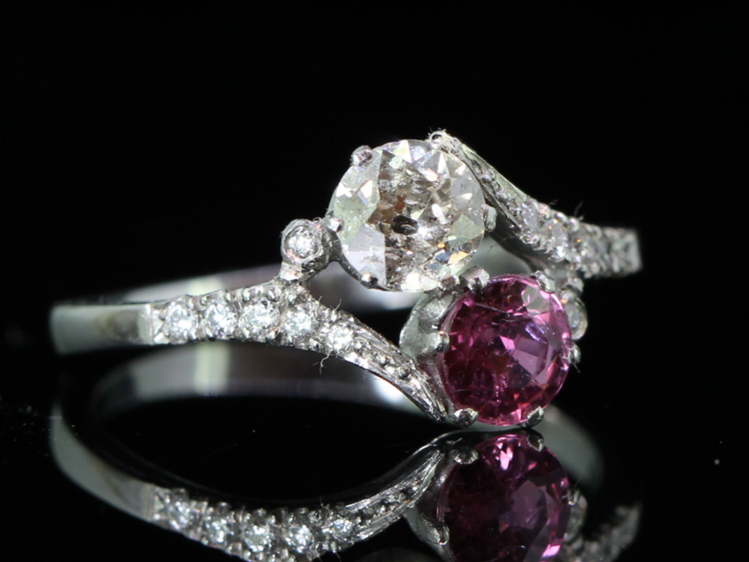 Elegant Ruby and Diamond on a Twist Platinum Ring