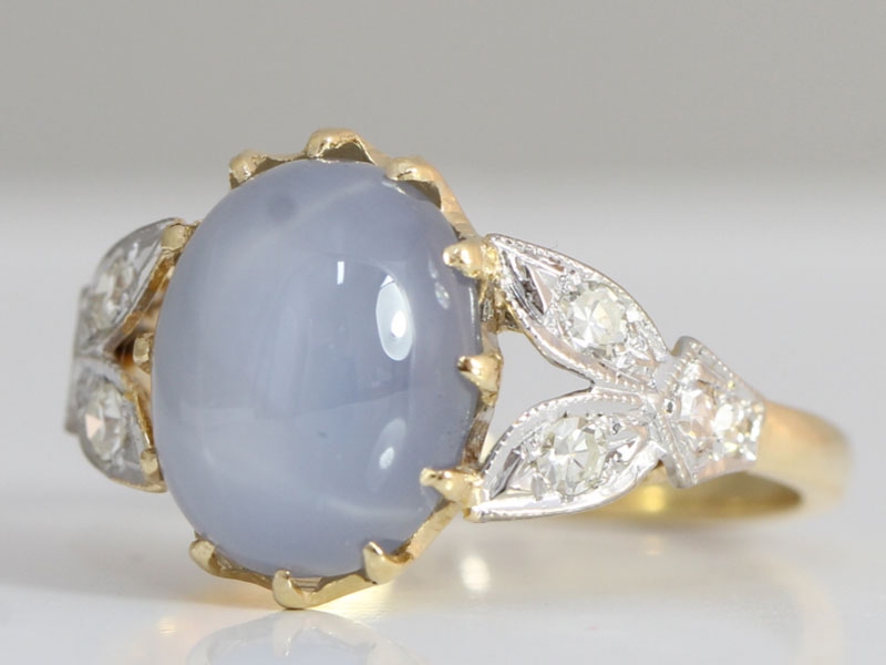 STUNNING STAR SAPPHIRE AND DIAMOND ART DECO INSPIRED 18 CARAT GOLD COCKTAIL RING