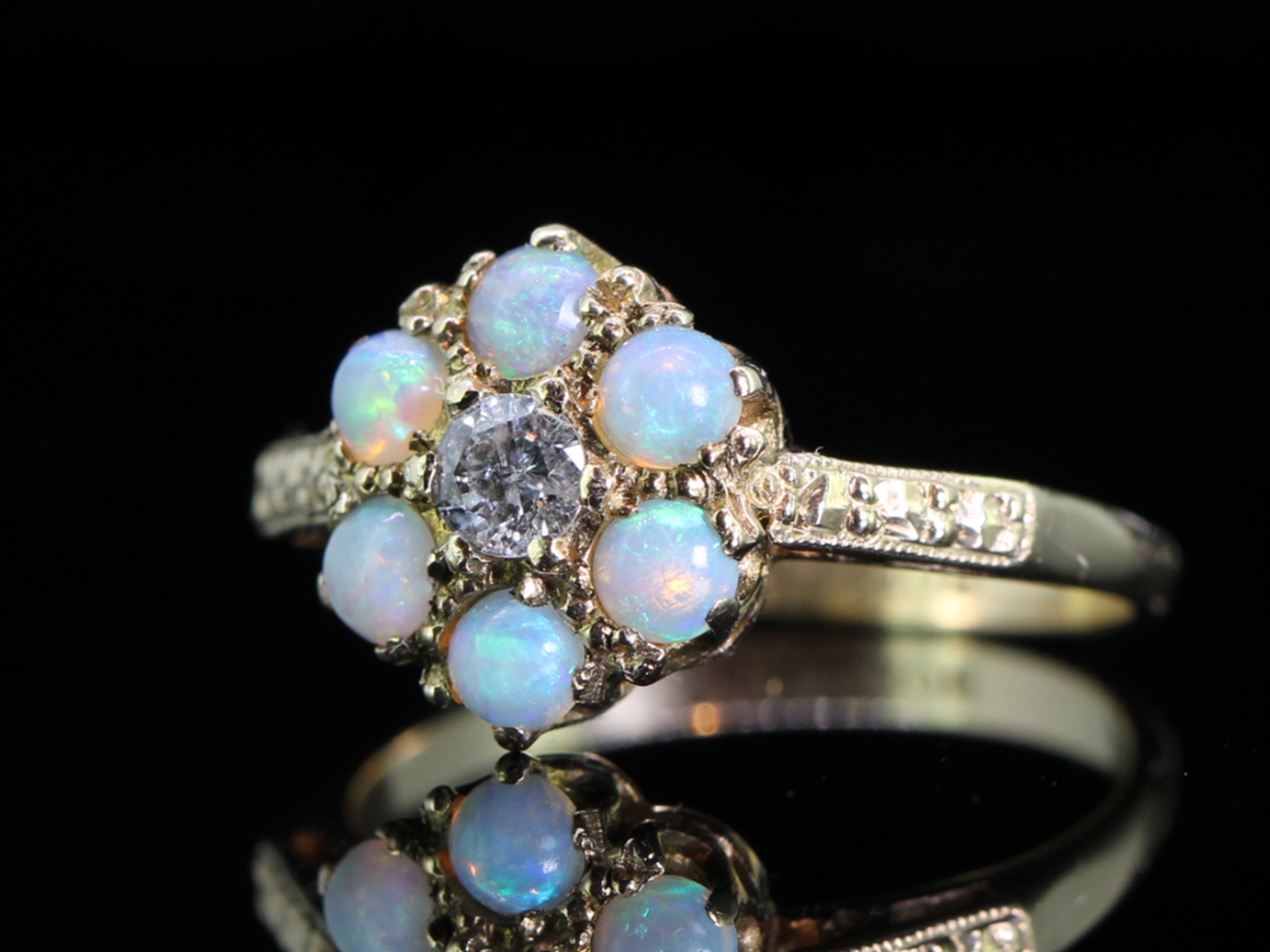 Pretty Opal and Diamond 9 carat Gold Cluster Ring