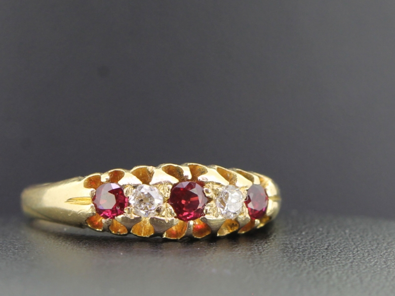 GORGEOUS RUBY AND DIAMOND 18 CARAT GOLD GYPSY RING