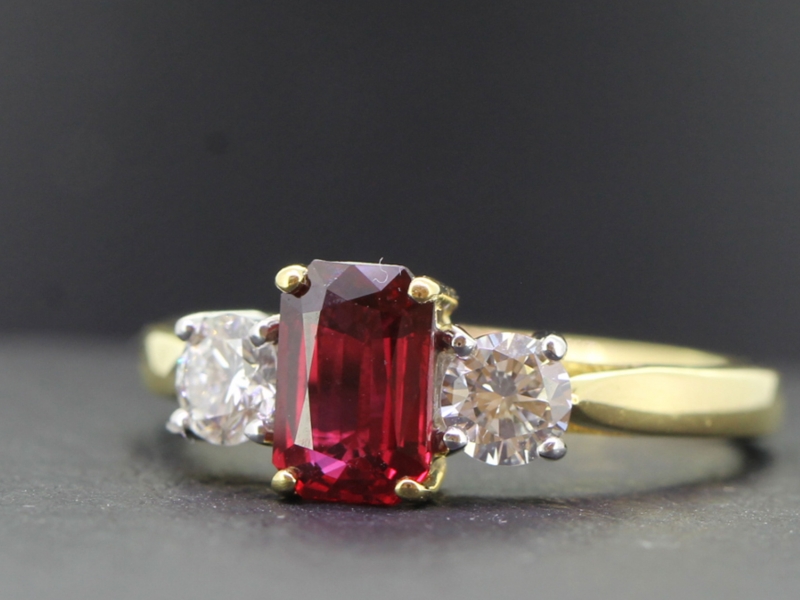 STUNNING RUBY AND DIAMOND 18 CARAT GOLD TRILOGY RING  