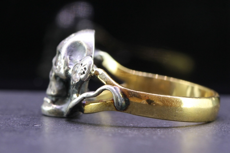 HANDSOME EDWARDIAN MEMENTO MORI 22 CARAT GOLD/SILVER SKULL AND SERPENT RING