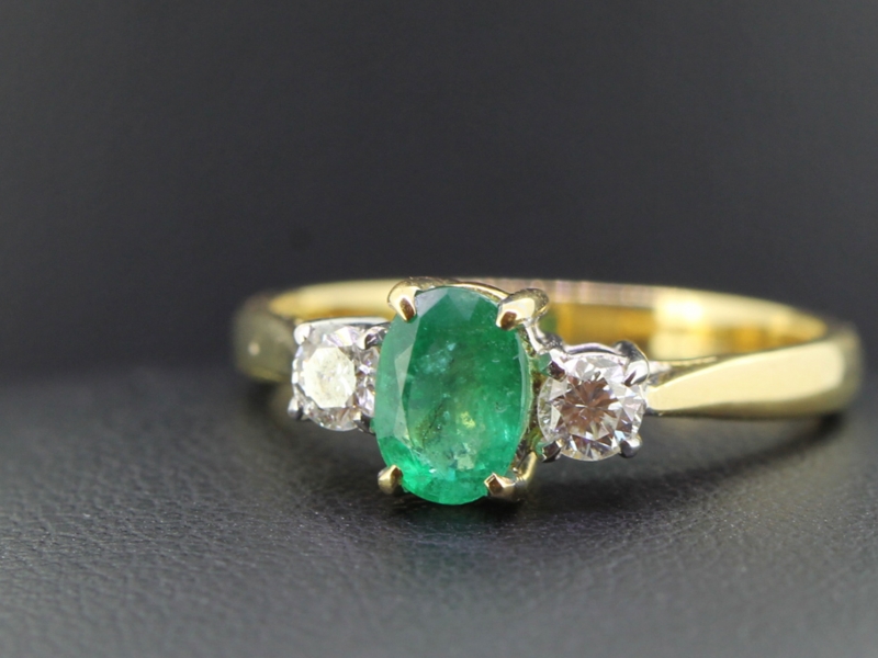 GORGEOUS EMERALD AND DIAMOND TRILOGY 18 CARAT GOLD RING