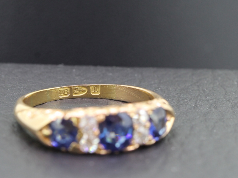 STUNNING EDWARDIAN CARVED HALF HOOP SAPPHIRE AND DIAMOND 18 CARAT GOLD RING