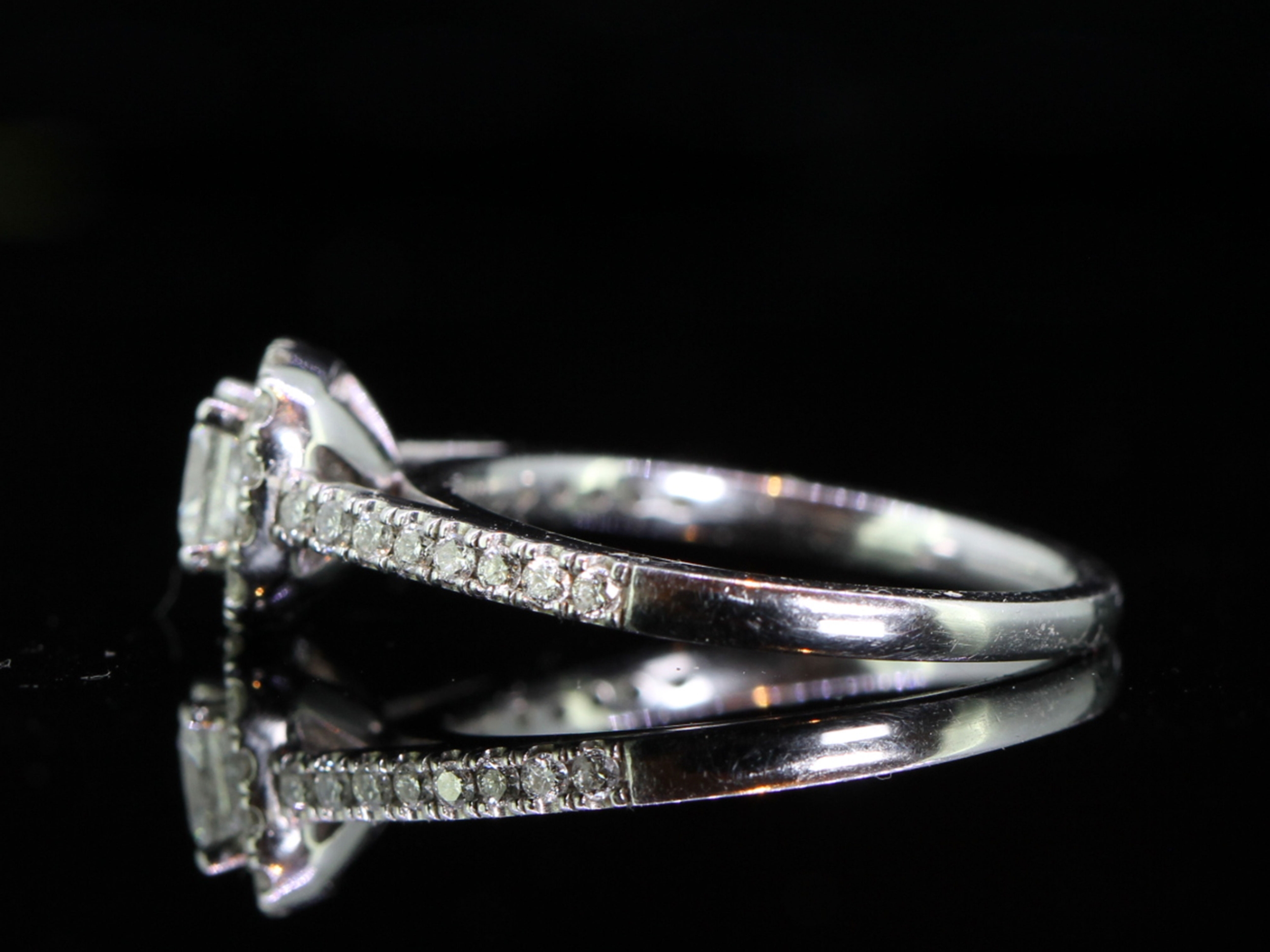 Stunning Princess and Brilliant Cut Diamond 18 Carat Gold Halo Ring