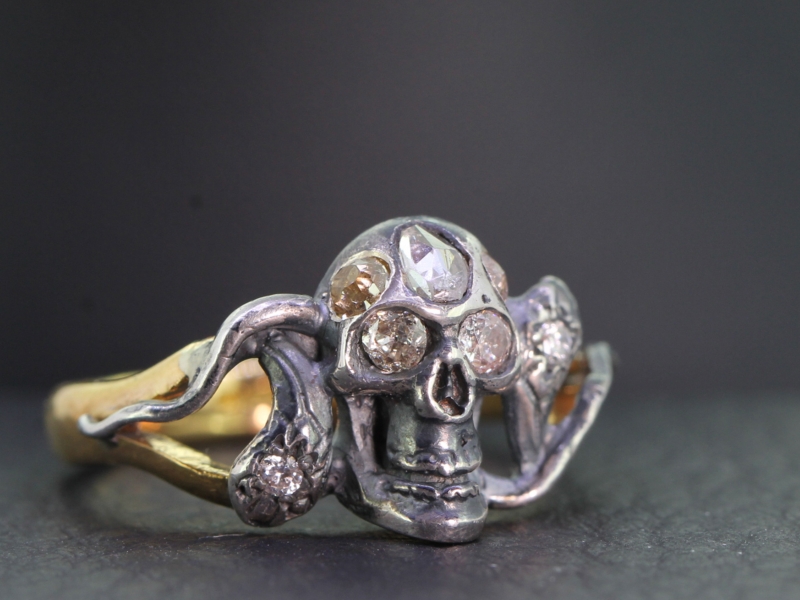 MAGNIFICENT 22 CARAT GOLD SILVER SET DIAMOND SKULL AND SERPENT RING
