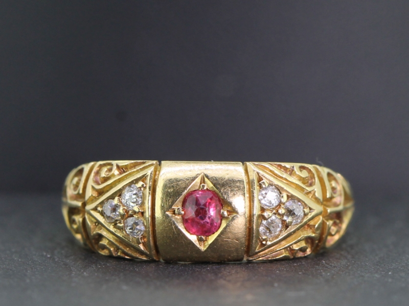 PRETTY RUBY AND DIAMOND 18 CARAT GOLD BAND