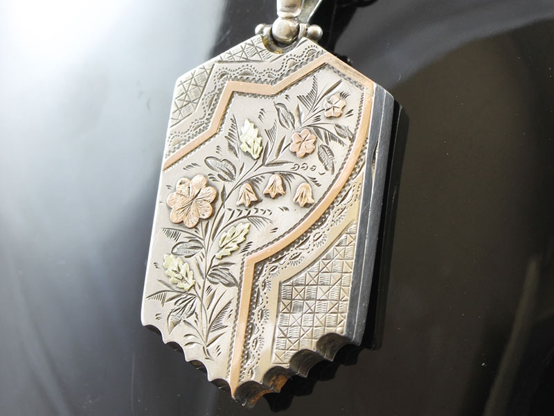  BEAUTIFUL SILVER AND GOLD LOCKET AND CHAIN