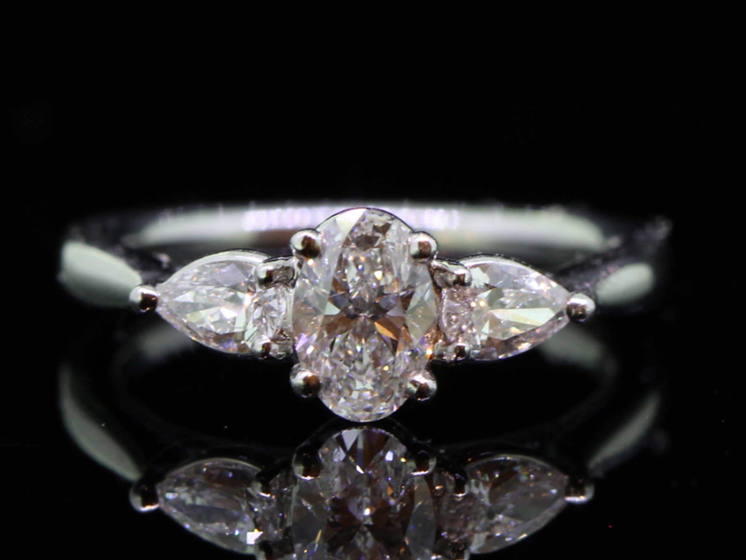 Romantic Platinum Oval and Pear Shape Diamond Trilogy Ring 