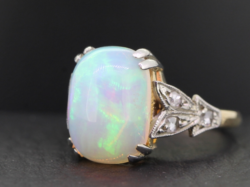 STUNNING OPAL AND DIAMOND 18 CARAT GOLD AND PLATINUM RING