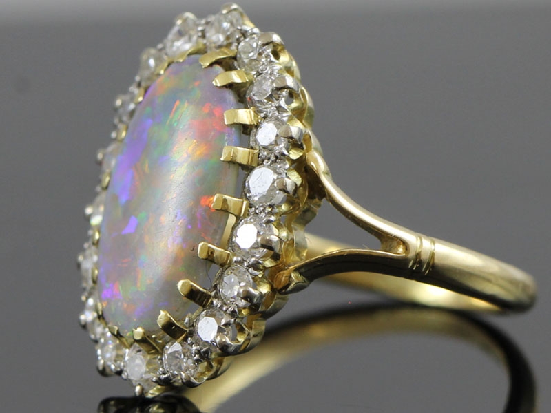 AN ORIGINAL EDWARDIAN OPAL AND DIAMOND 18CT GOLD RING