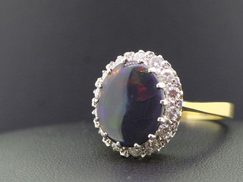  SPECTACULAR OPAL AND DIAMOND CLUSTER 18 CARAT GOLD RING