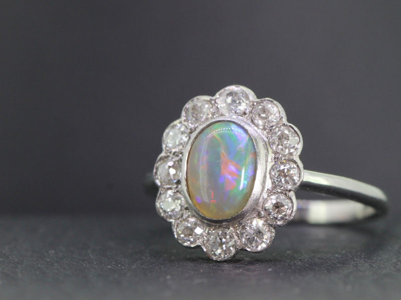 SPELLBINDING BLACK OPAL AND DIAMOND PLATINUM CLUSTER RING