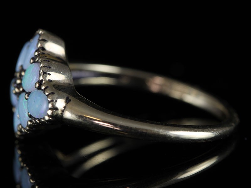 A VERY PRETTY  9 CARAT GOLD OPAL AND DIAMOND FLOWER RING