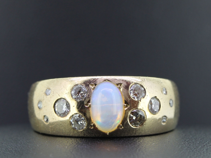 UNIQUE OPAL AND DIAMOND 9 CARAT GOLD BAND