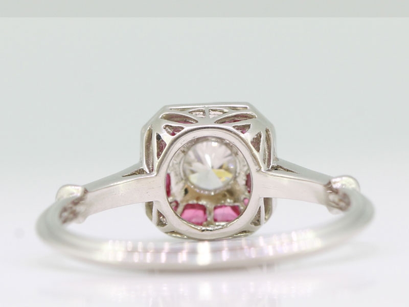 ART DECO INSPIRED DIAMOND AND RUBY PLATINUM TARGET RING