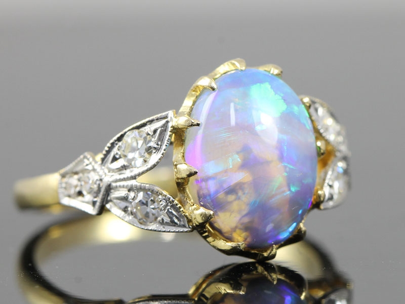 STUNNING BLACK CRYSTAL OPAL AND DIAMOND EDWARDIAN INSPIRED 18 CARAT GOLD RING 