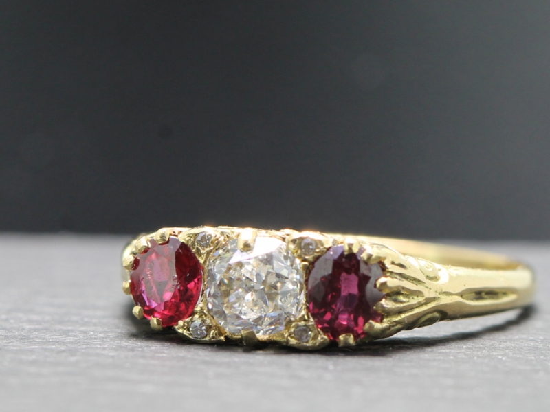BEAUTIFUL RUBY AND DIAMOND 18 CARAT GOLD CARVED HALF HOOP RING