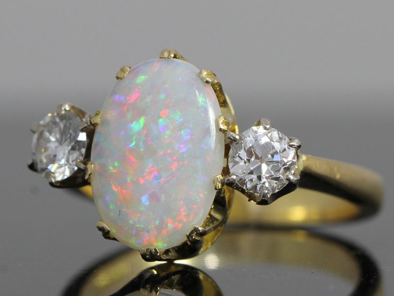 FABULOUS OPAL AND DIAMOND TRILOGY 18 CARAT GOLD RING