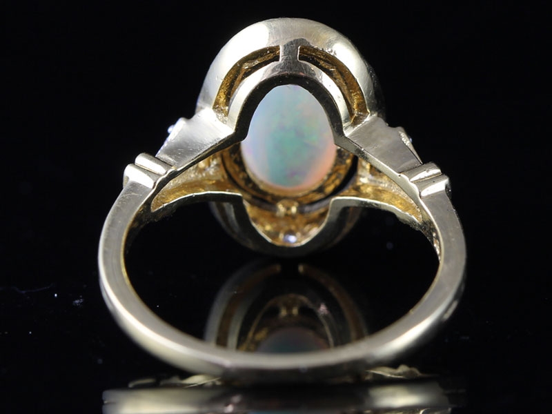 ENCHANTING OPAL AND DIAMOND 18 CARAT GOLD RING