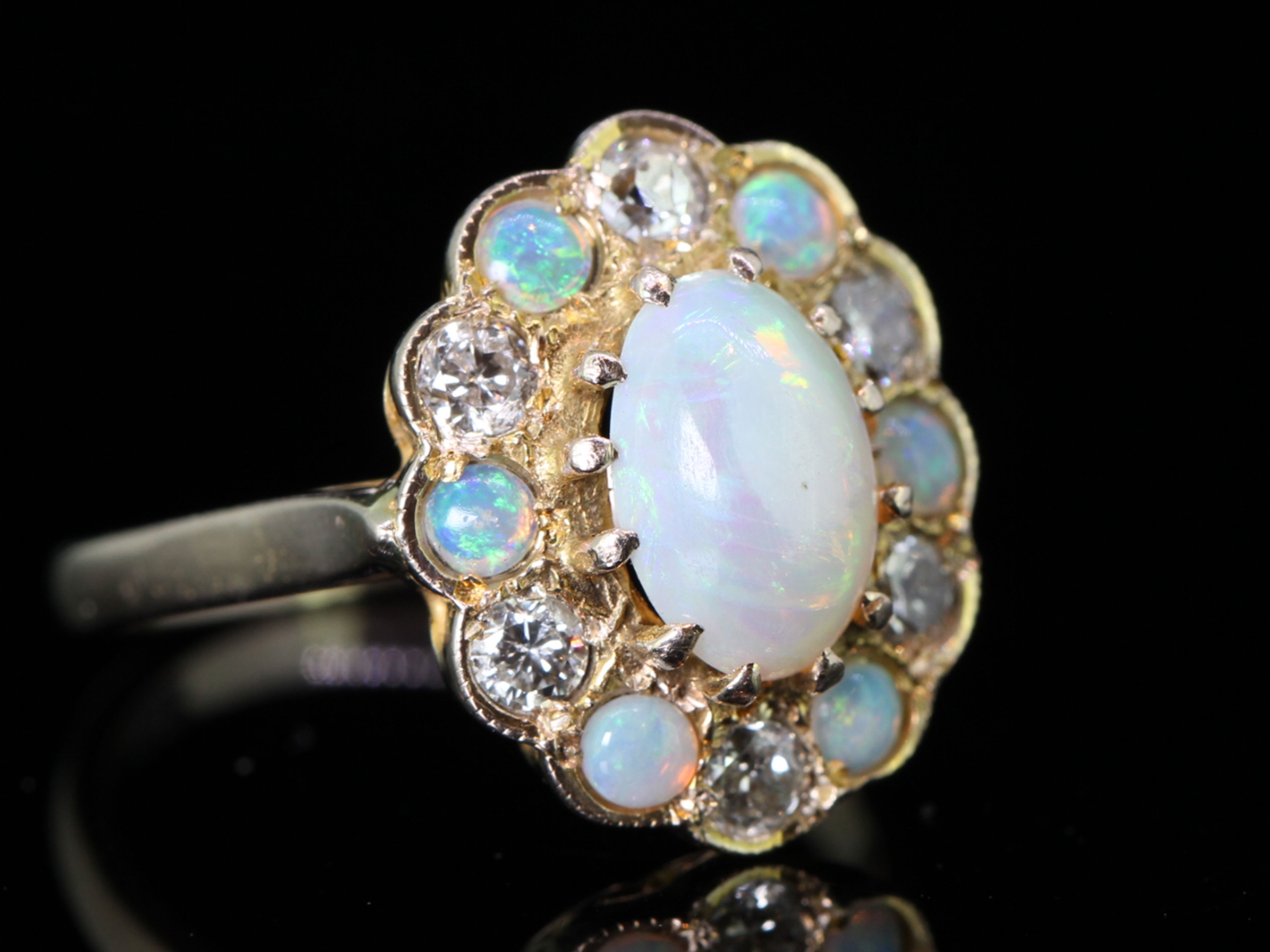Tantalizing Opal and Diamond 9 carat Gold Cluster Ring