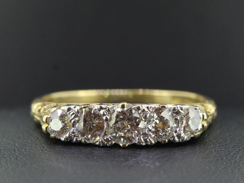 PRETTY EDWARDIAN FIVE STONE DIAMOND 18 CARAT GOLD RING