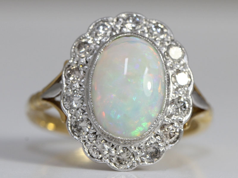  ALLURING OPAL AND DIAMOND 18 CARAT GOLD CLUSTER RING