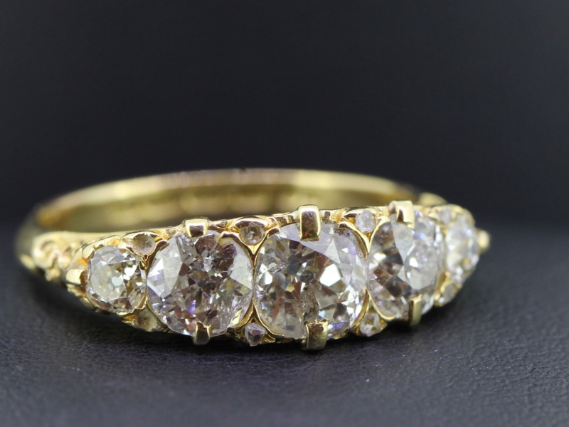 FABULOUS EDWARDIAN FIVE STONE 18 CARAT GOLD RING