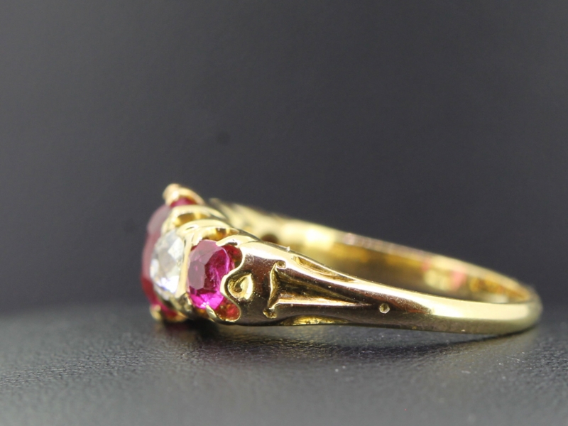 VIVACIOUS RUBY AND DIAMOND FIVE STONE 18 CARAT GOLD RING