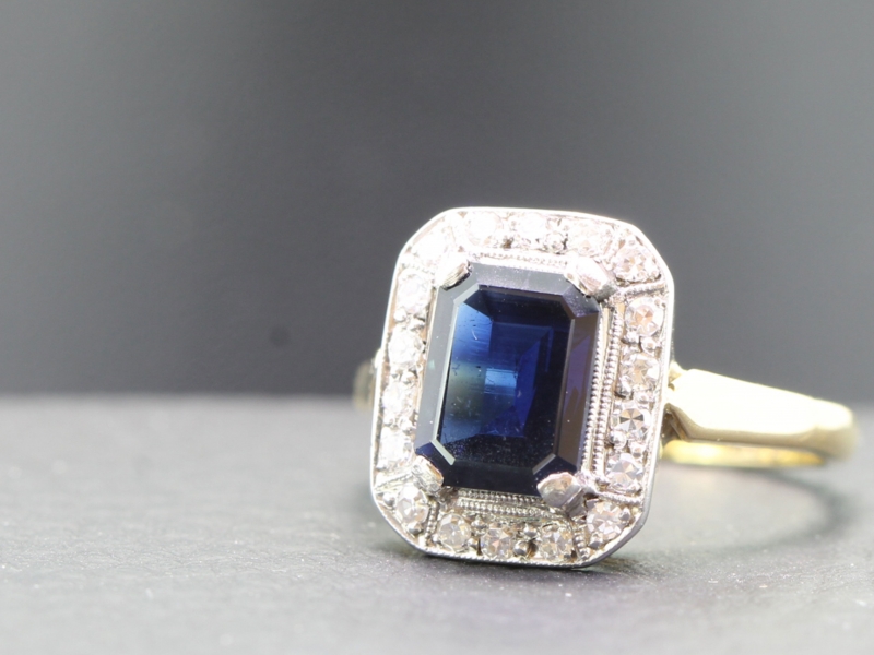 LATE ART DECO RECTANGULAR SAPPHIRE AND DIAMOND 18 CARAT GOLD AND PLATINUM RING