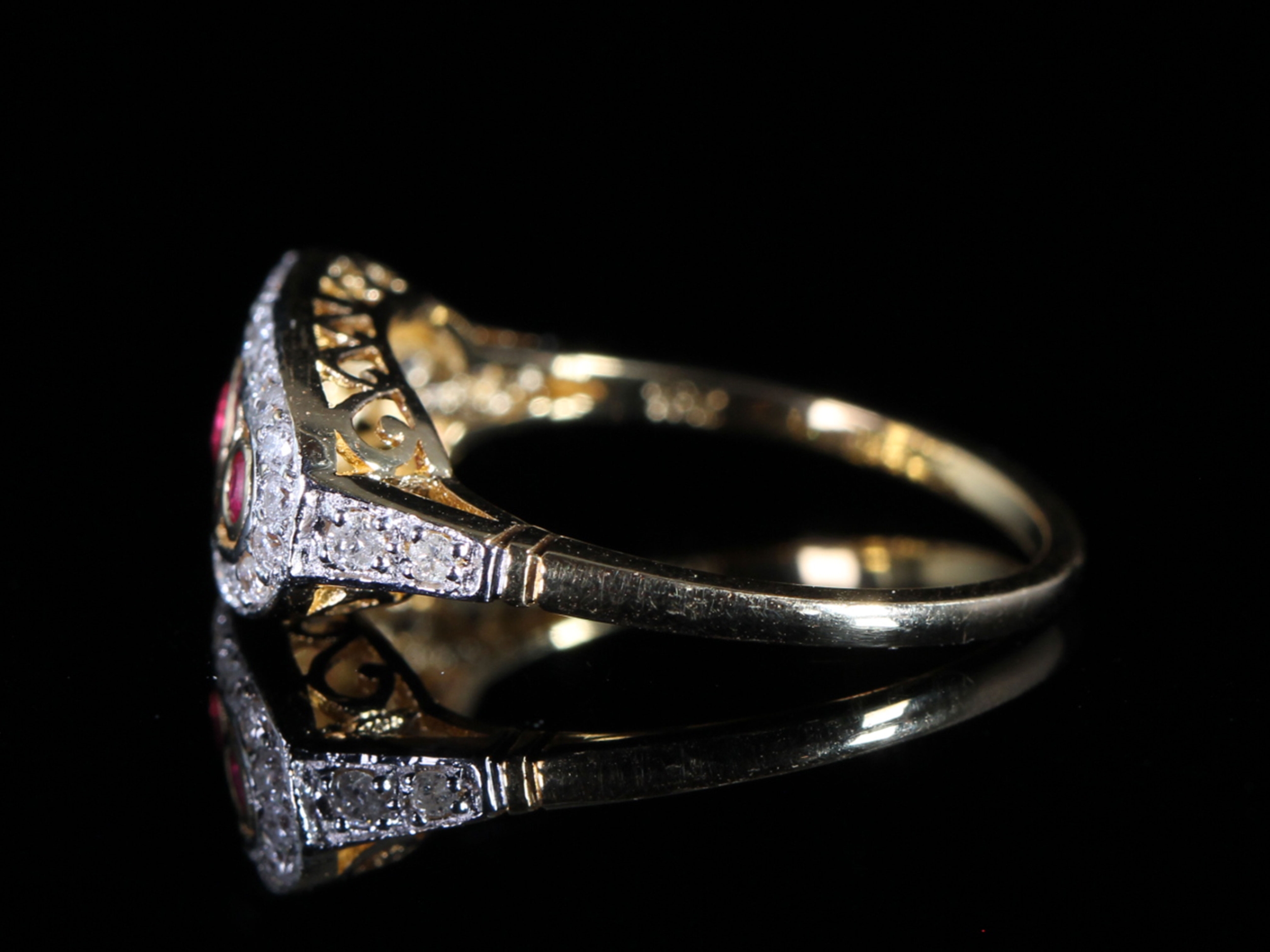 An Estate Ruby and Diamond Art Deco Style 18ct Gold Ring